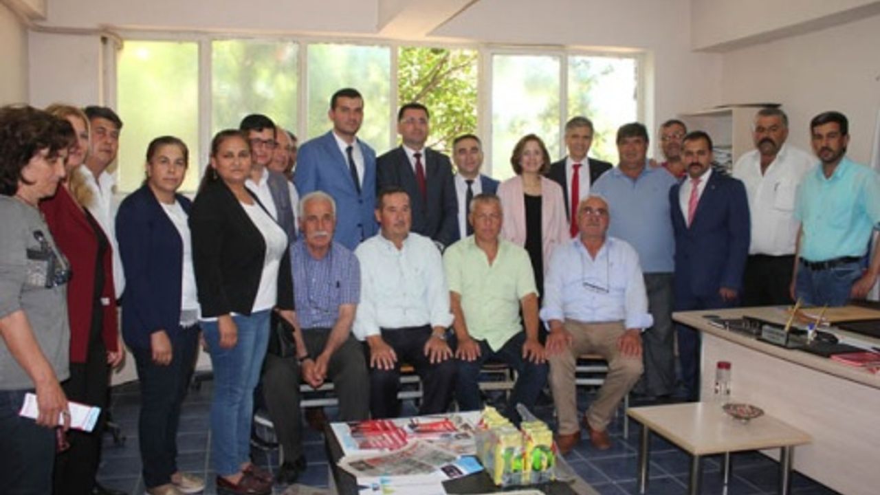 MHP’li Heyet Muhtarları ve Esnafı Ziyaret Etti